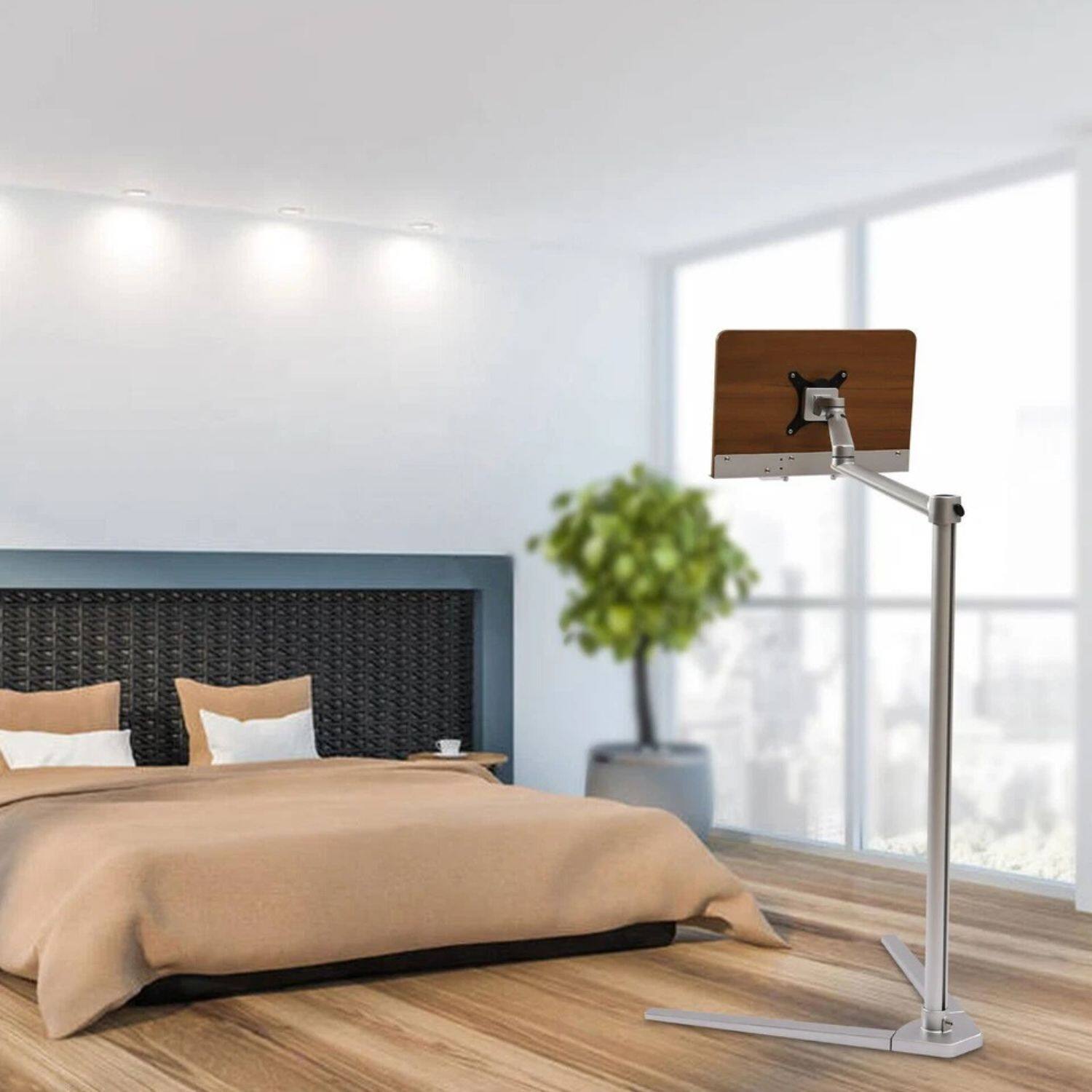 Left. Stock Preferred - Adjustable Floor Book Holder Stand - Frosted Silver Frame with Brown MDF Shelf.