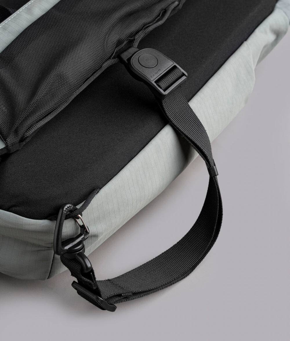 Alt View 9. ALPAKA - Crossbody Sling Bag 7.5L (Left Shoulder) for Men, Fits 11" Tablet, Phone Sleeve, Bottle Pocket, Luggage Pass-Through - Grey Axoflux 210D.