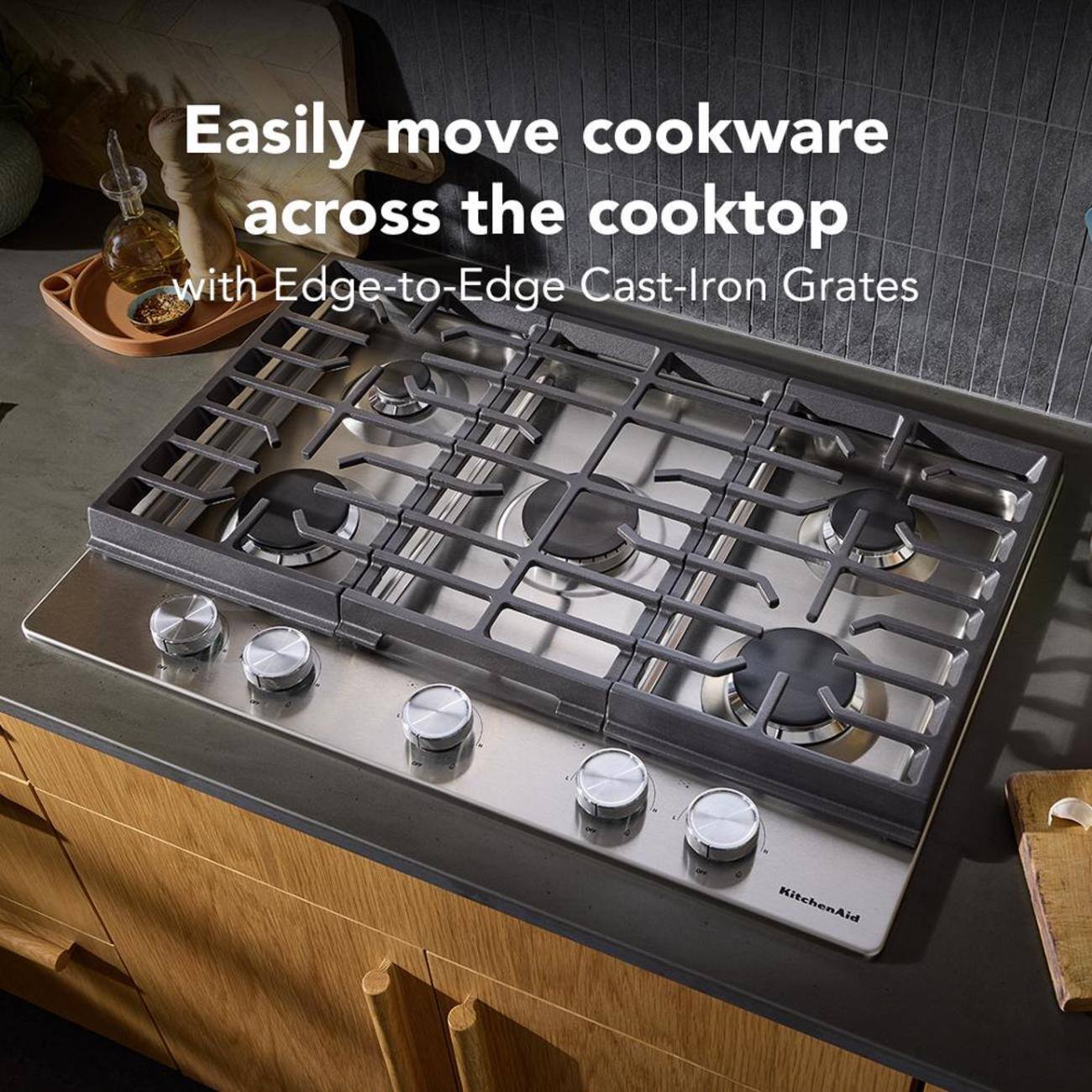 Easily move cookware across the cooktop with Edge-to-Edge Cast-Iron Grates

KitchenAid