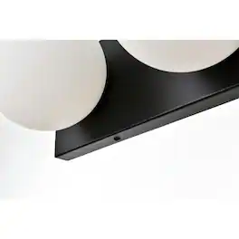 Living District - Jaylin 3 light Bath Sconce - Black And Frosted White