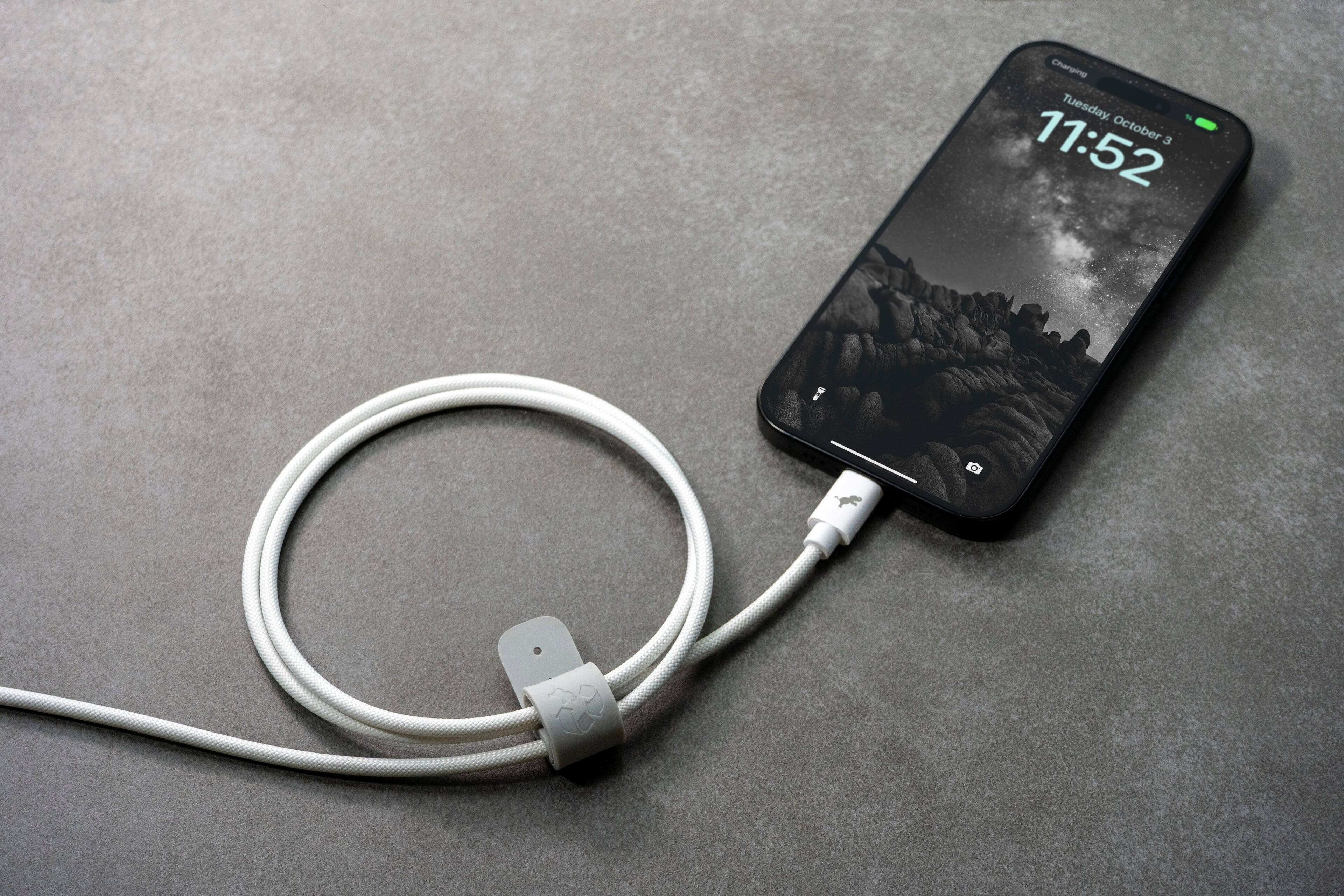 Charging Tuesday, October 3, 11:52.