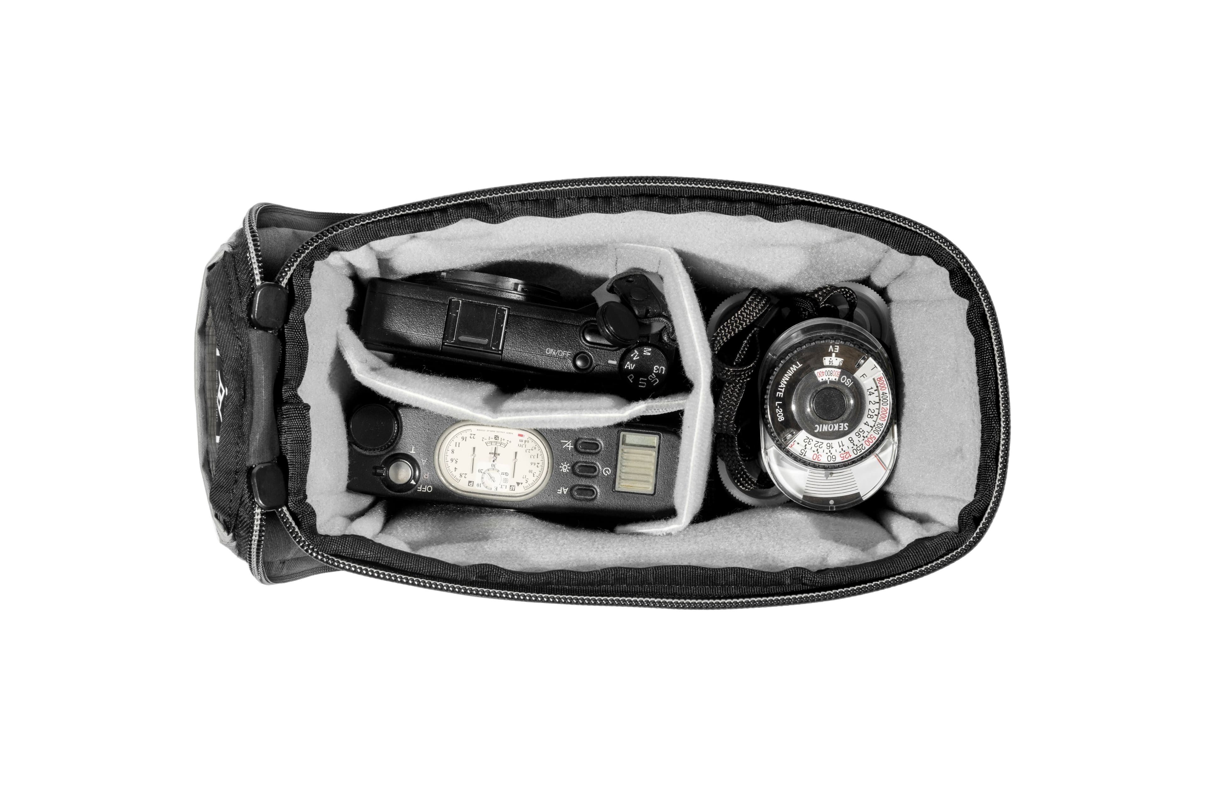 The text on the image reads: "1 a OFF ON/OFF - 1 e e e dD w a mi H 1S 2 - - - - " T - 4 . -. - - . AF s M - por En a in EA I 4 TWINMATE TO O8 F S 8000 L-208 SEKONIC -o I g 20% 2 6 i 500 SI 5a 0062 a 00". This text appears to be a combination of various settings and instructions for a device or appliance. It is not clear what the specific purpose of this text is, but it seems to be related to controlling or adjusting the settings of a device.