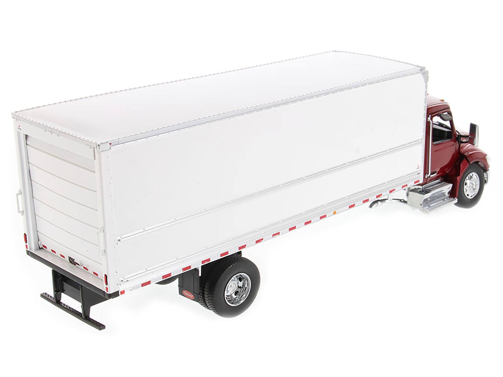 Left. Diecast Masters - Peterbilt 536 Truck with Supreme Signature Van Body Red Metallic "Transport Series" 1/32 Diecast - Red Metallic.