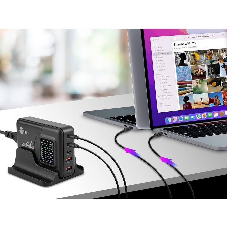 Sure, here is the corrected and grouped text:

**Shared with You**
- November 2020 - October 2021
- 239 Photos, 42 Videos

**Library**
- Photos
- Library
- Shared with You
- Memories
- People
- Places
- Events
- Recents
- Imports
- Albums
  - Album Types
    - Videos
    - Selfies
    - Live Photos
    - Portraits
    - Panoramas
    - My Albums
- Projects
- My Projects

**Sidebar**
- SIS Ploten a. widLeS mmuton
- Larary Aenories
- SAces nLam mues Favorites
- Shared with You
- Getober s00
- November -e
- Seconts impors
- Soda Types
- VAs Suffes
- Live Phatit
- Pertral Sereenshut
- Dored -s
- My Abuta Pom
- Projects 18
- SING
- 2N uscd P
- To C

**Device**
- SLIK
- USB-C 2.0
- 2