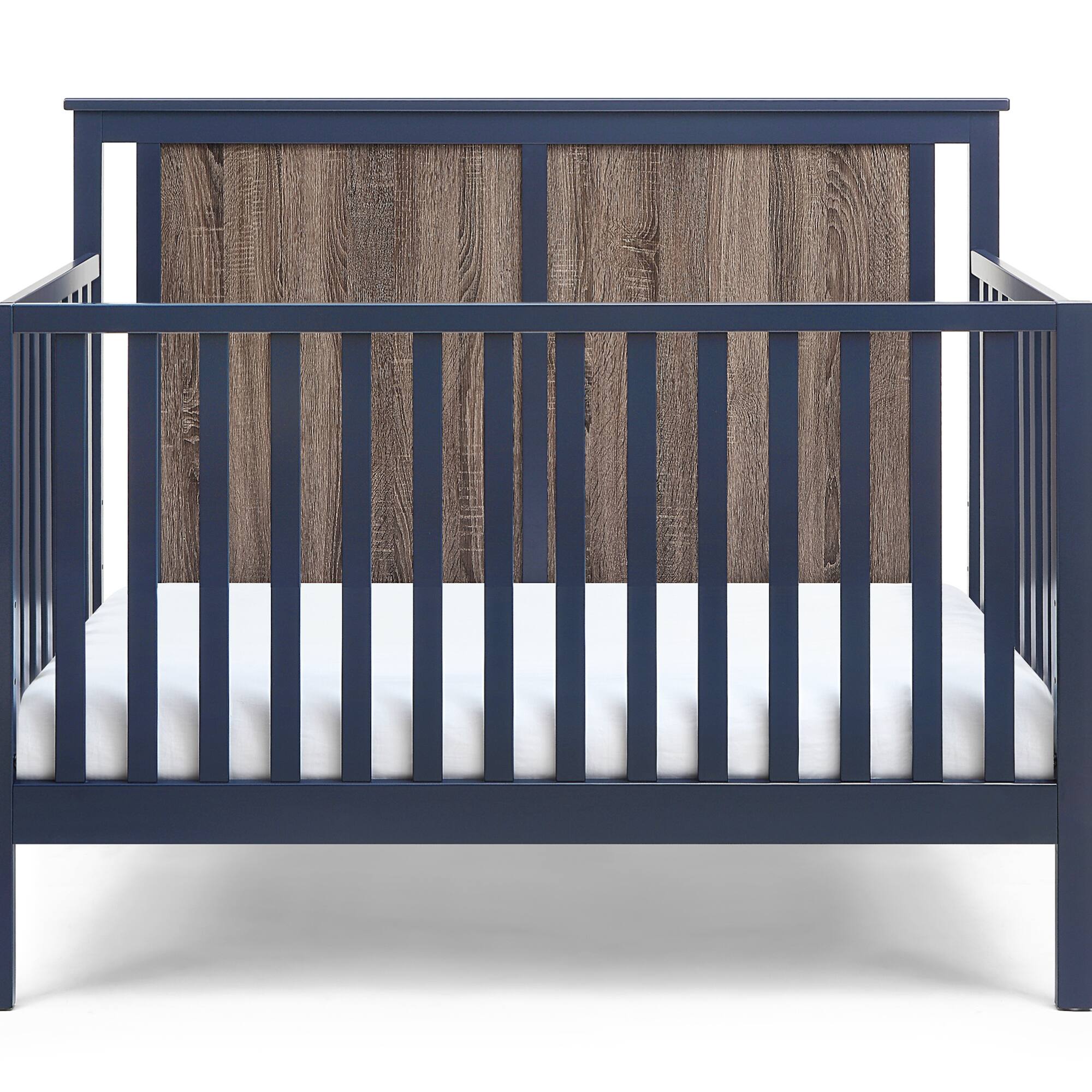 Angle. GOODSILO - 4-in-1 Convertible Crib with Dual-Tone Finish - Adjustable Mattress Heights for Safe Infant Sleeping and Growing - Blue+Brown.