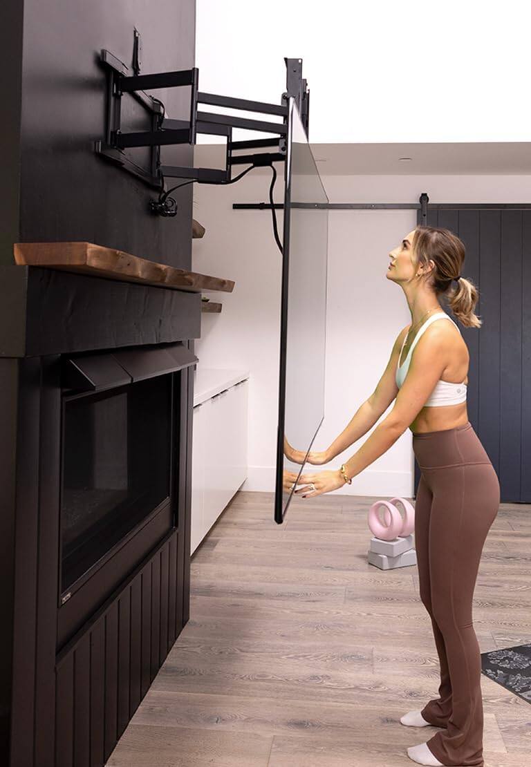 Alt View 6. MantelMount - MAX1 Full Motion Fireplace Pull Down TV Mount-Lowers 29", Swivels 40° L/R, 3" Flush to Wall, for TVs 50"-86" to 90 lbs - Black.