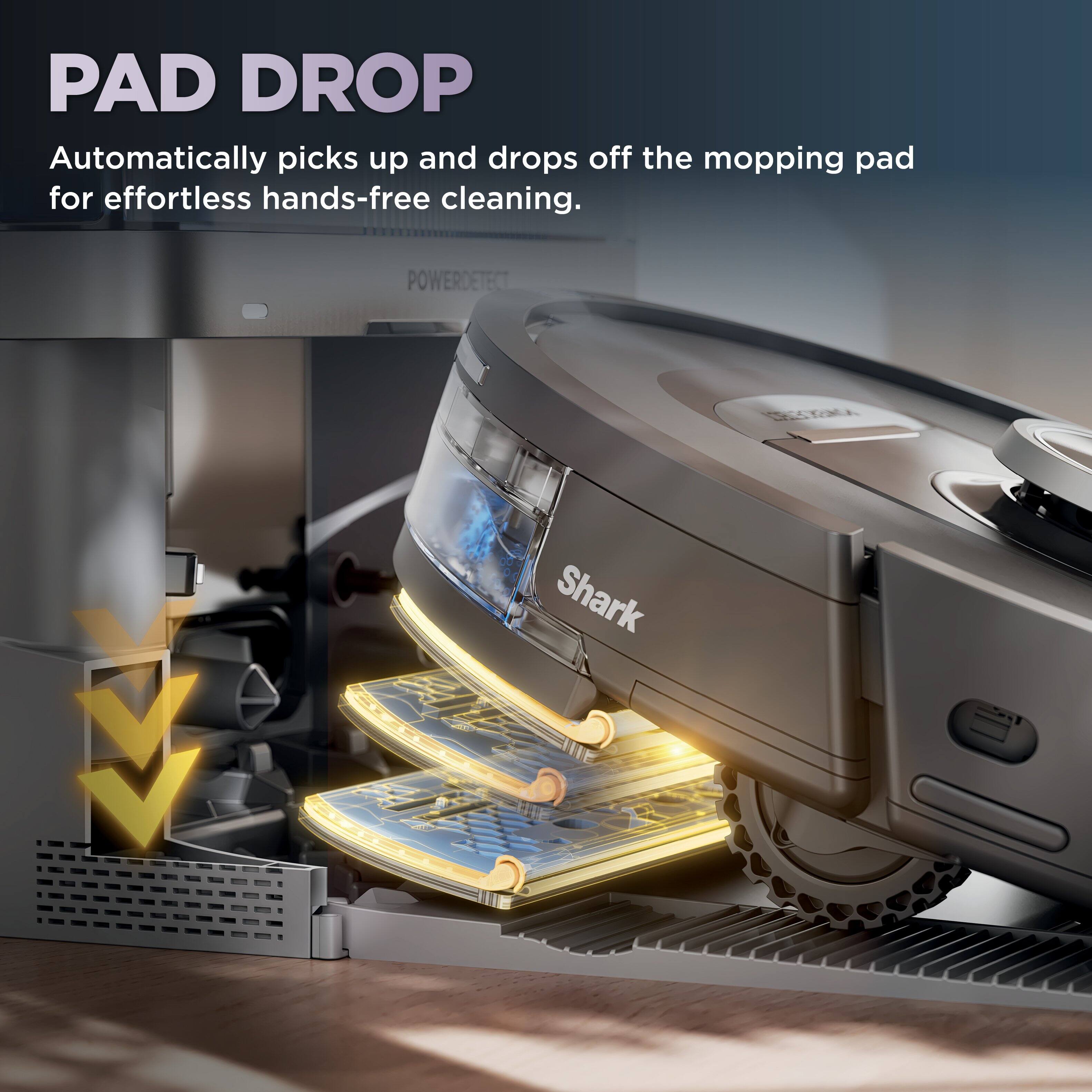 The image features a Shark floor cleaner with a pad drop system. The pad drop system automatically picks up and drops off the mopping pad for effortless hands-free cleaning. The image also shows a close-up of the pad drop system in action.