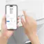 The text on the image reads: "11:14 a HealthPro 250 XE COOO-O : AQI uS PM25  Last update 744 Good 1 Good 20 + IQAir A History Hourly Daily Monthly eo + Mode Manual."