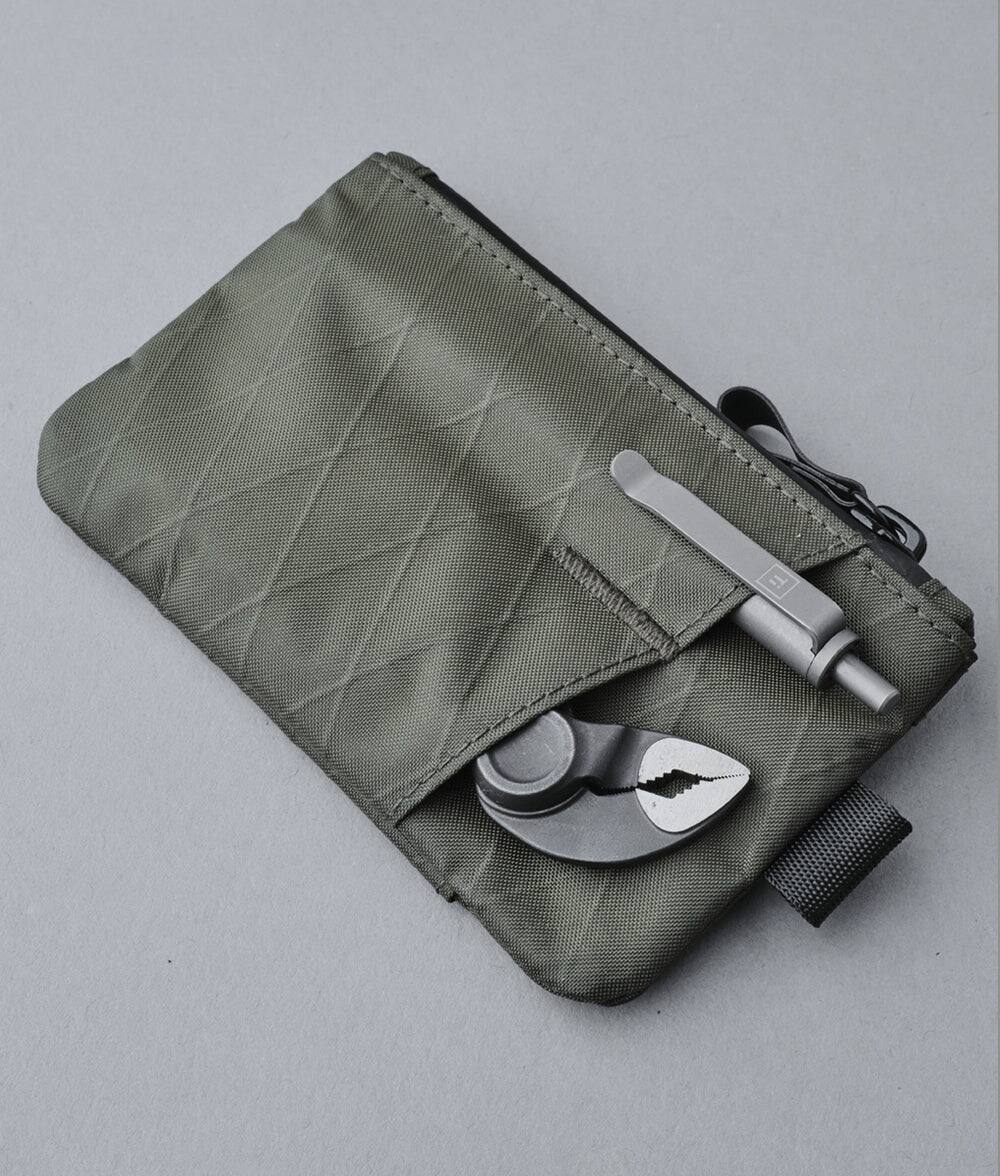 Angle. ALPAKA - Zip Pouch Pro - Minimalism Zipper Wallet - RFID Blocking, ID Card Holder,Men’s Wallet with Multi-tool Slot - Dark Green X-Pac VX21.
