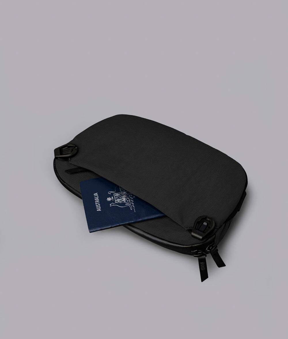 Alt View 4. ALPAKA - Flight Sling Pro 2.5L Sling Bag Crossbody Bag for Men, Bottle/Umbrella Sleeve, Fits 8.3" Tablet, YKK AquaGuard - Black Axoflux 400D Ripstop Nylon.