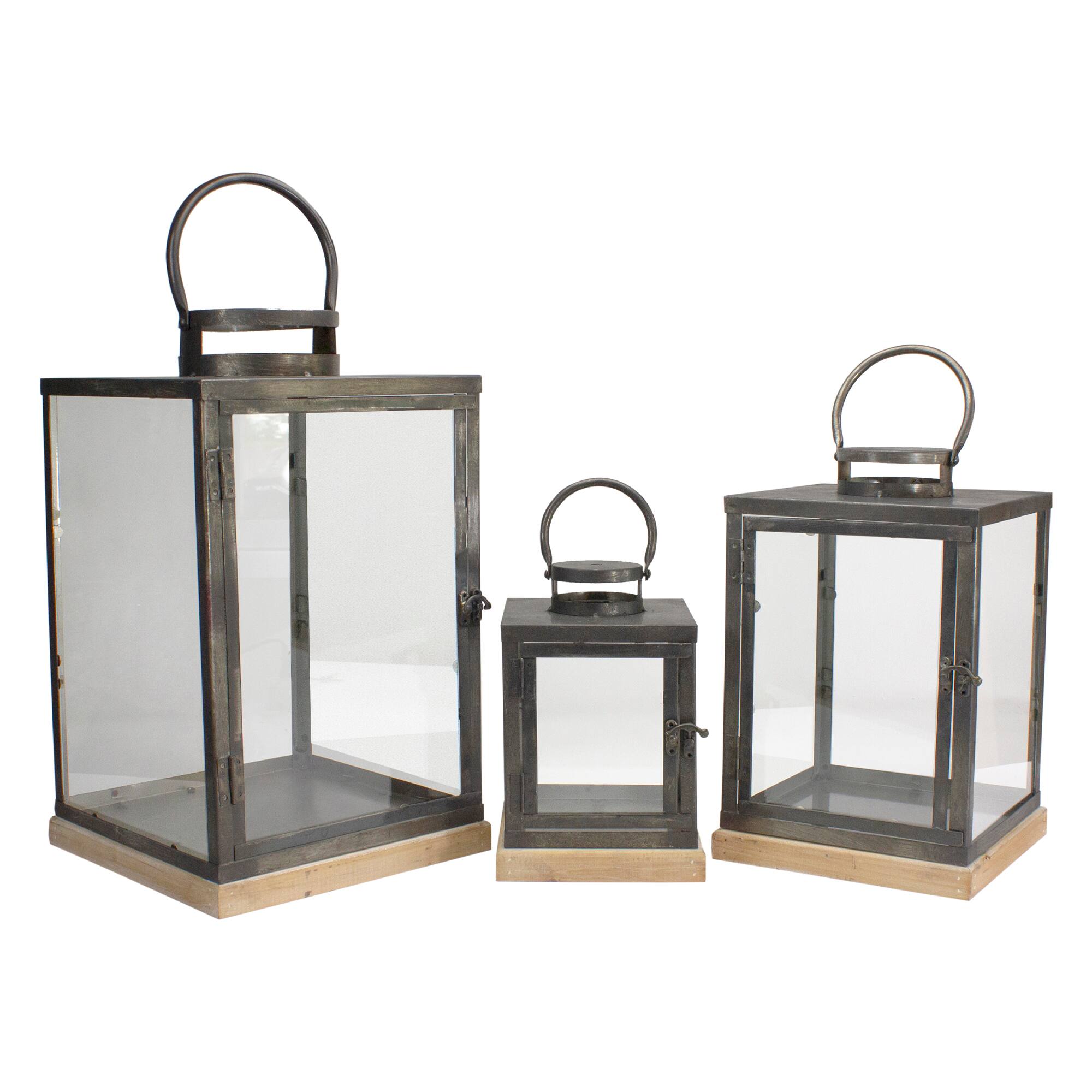Front. Melrose - Set of 3 Bronze Glass Candle Lanterns With a Latch Hook Lock - 21" - Bronze.