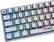 The image features a white and blue keyboard with a colorful rainbow design. The keys are arranged in a standard layout, with the letters and numbers visible. The keyboard is designed by HIGROUND and is likely intended for gaming or other computer-related activities.