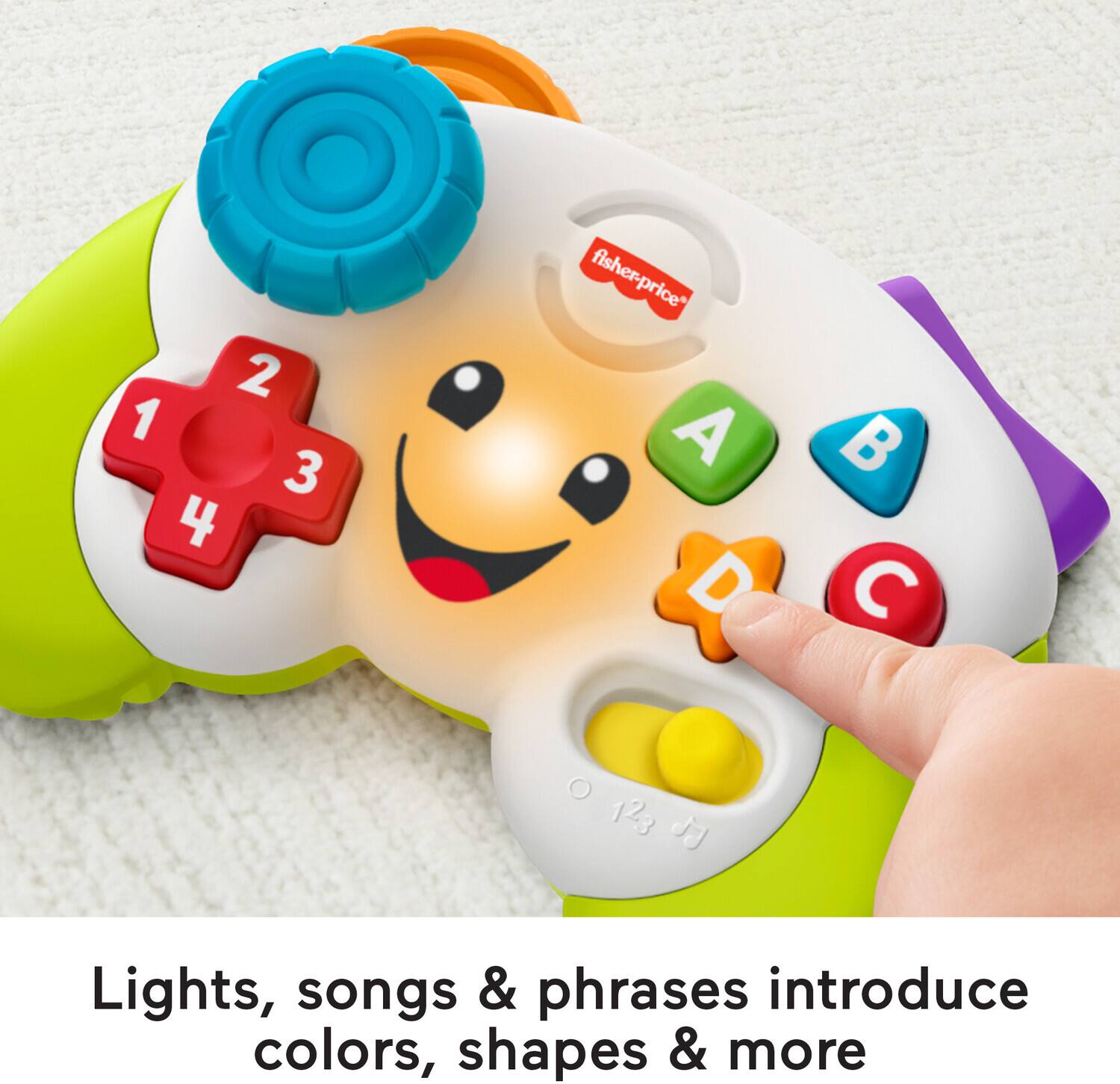 Lights, songs & phrases introduce colors, shapes & more