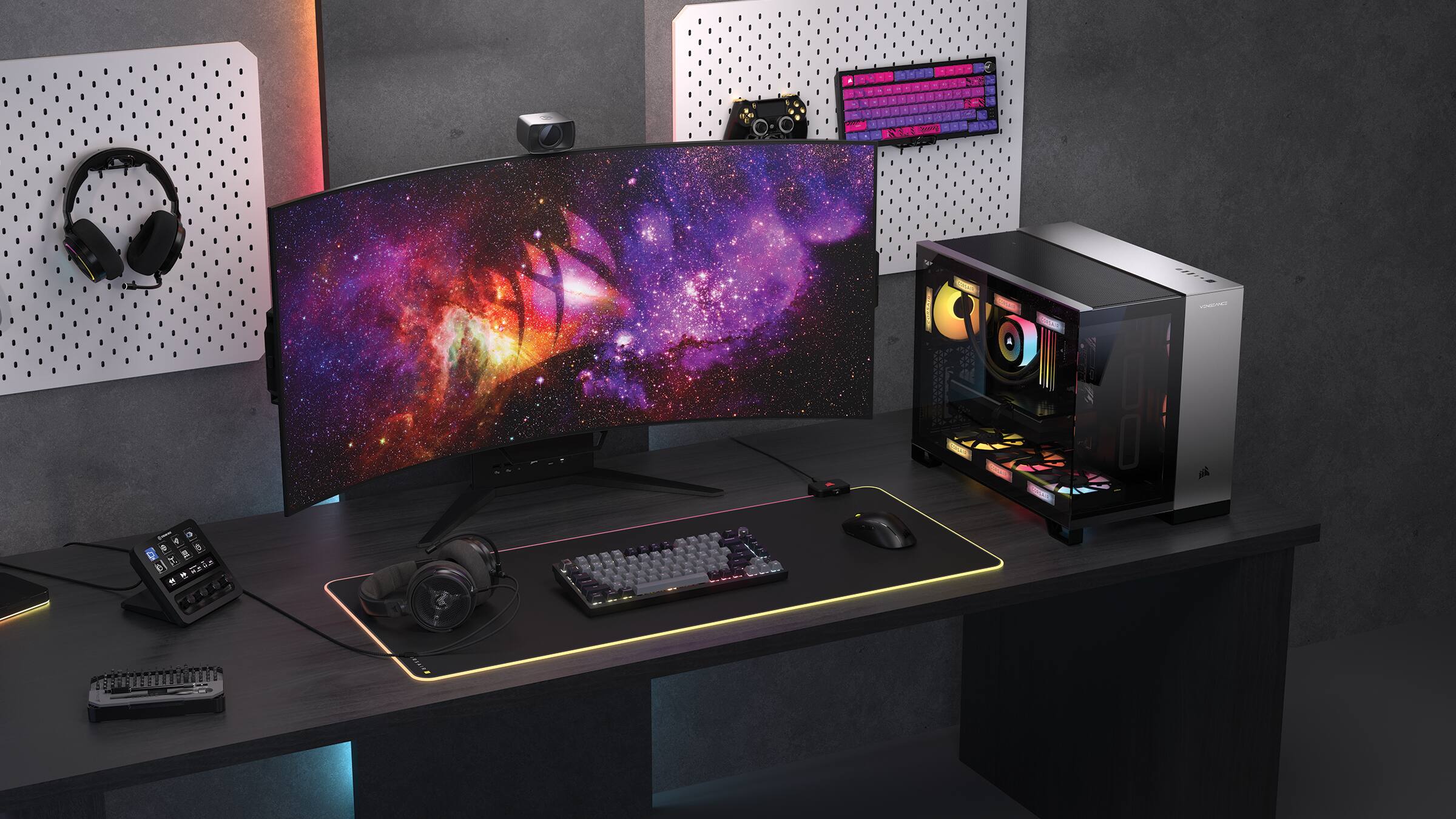 A 4K computer monitor sits on a desk with a keyboard and mouse.