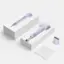 The image shows a white box containing a purple product, which is a hair dryer. The box is open, revealing the hair dryer inside. The hair dryer is designed by Lorn and has a sleek appearance. The box also includes a card and a small purple accessory, which is placed next to the box.