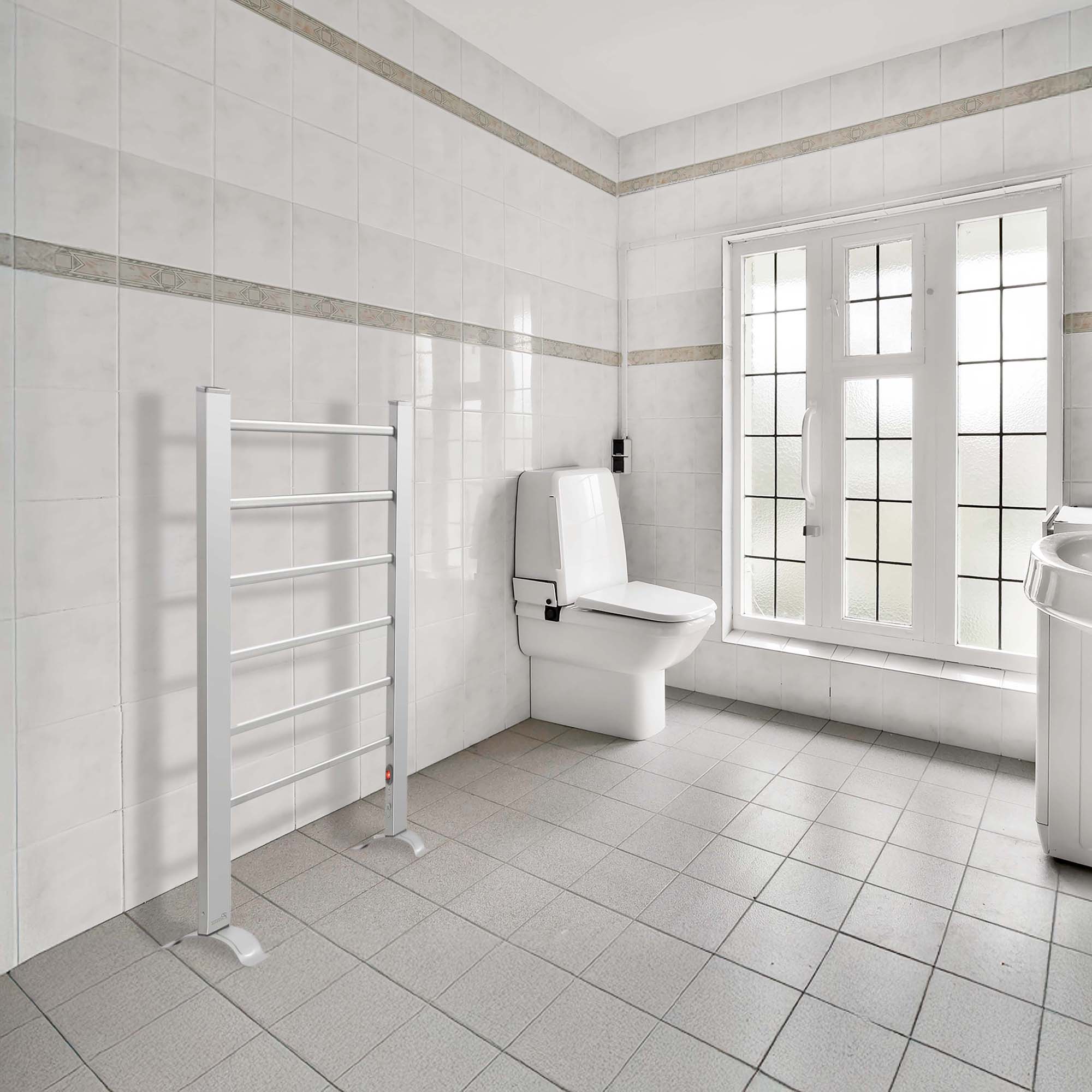 Angle. Pursonic - Pursonic Stainless Steel Free Standing Towel Warmer - Silver.