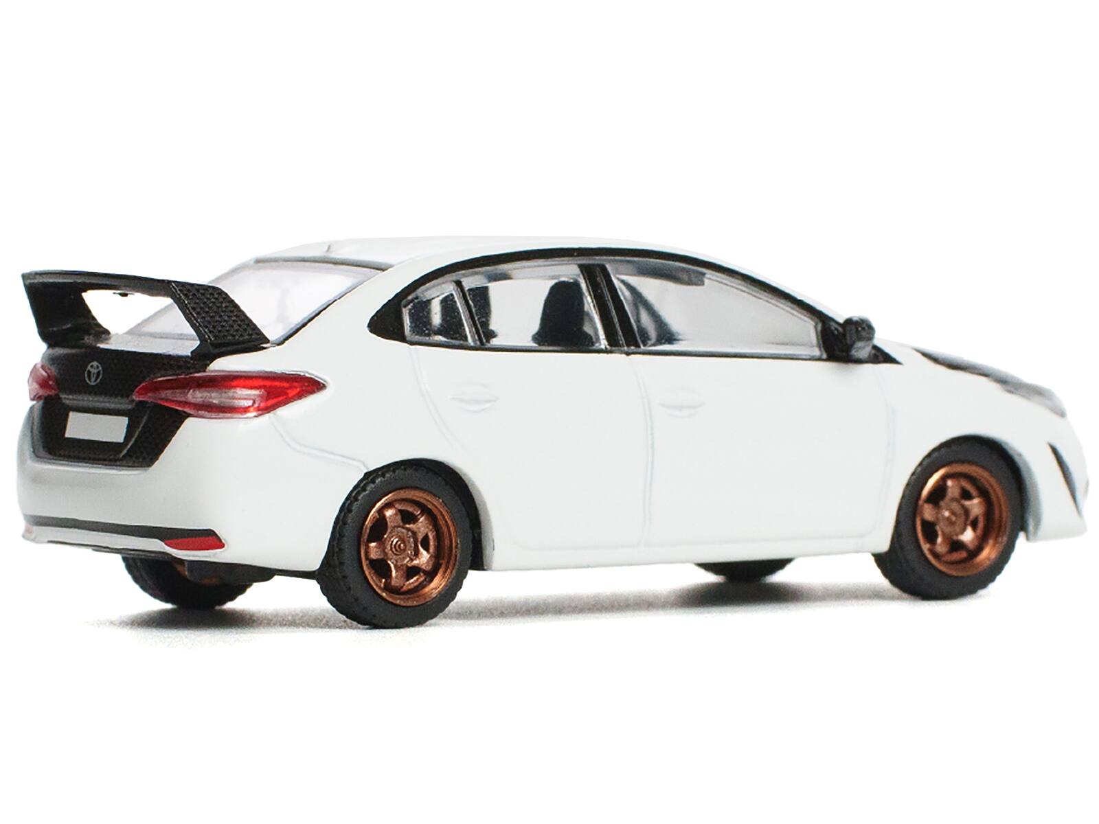 Left. Pop Race - Toyota GR Vios White with Carbon Hood 1/64 Diecast Model Car by Pop Race - White with Carbon.