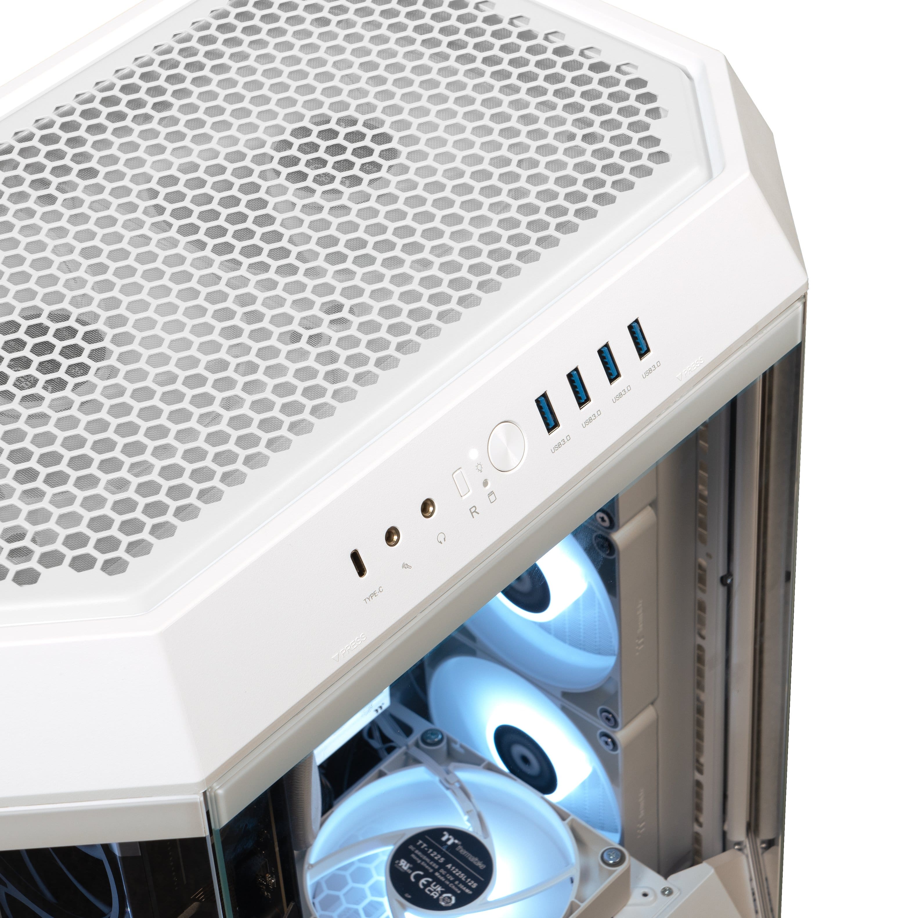 A white computer tower with a blue light shining through it. The tower is open, revealing the internal components, including a fan and a hard drive.