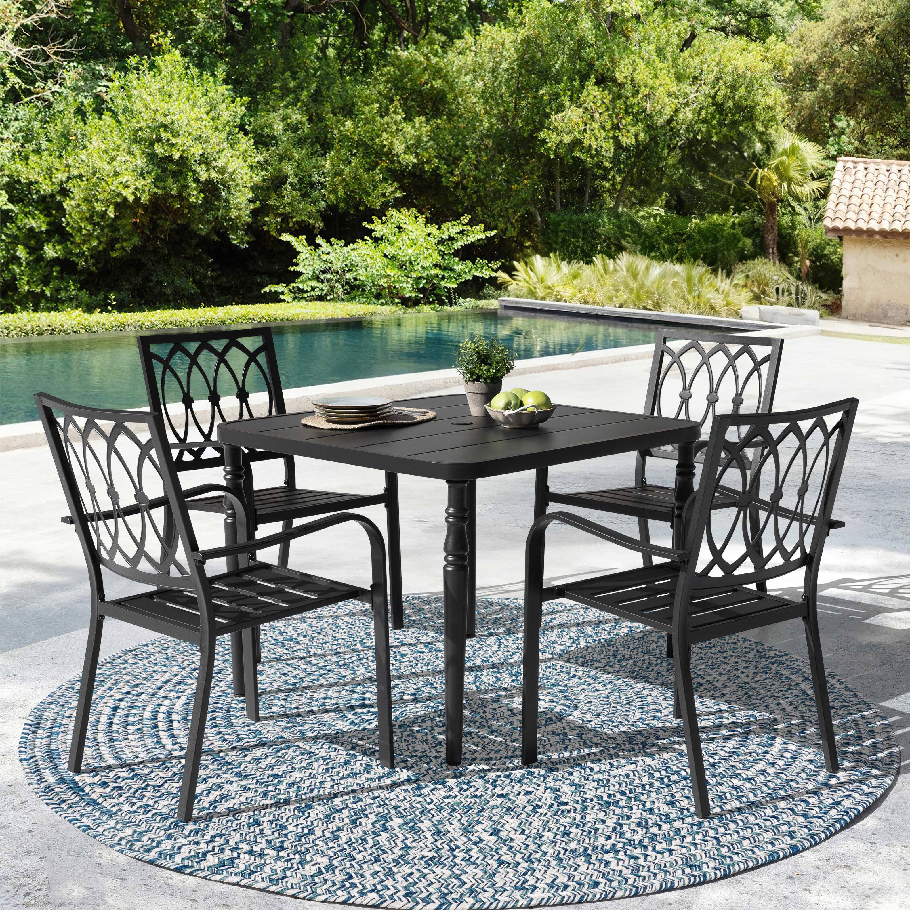 Angle. Nuu Garden - 5-Piece Metal Patio Dining Set with Umbrella Hole and 4 Stackable Chairs - Black.