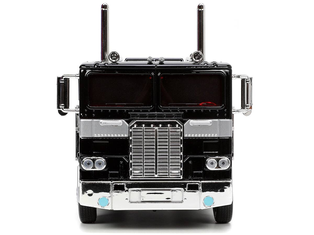 Back. Jada - Decepticon Nemesis Prime with Robot on Chassis "Transformers" TV Series "Hollywood Rides" Series 1/24 - Black.