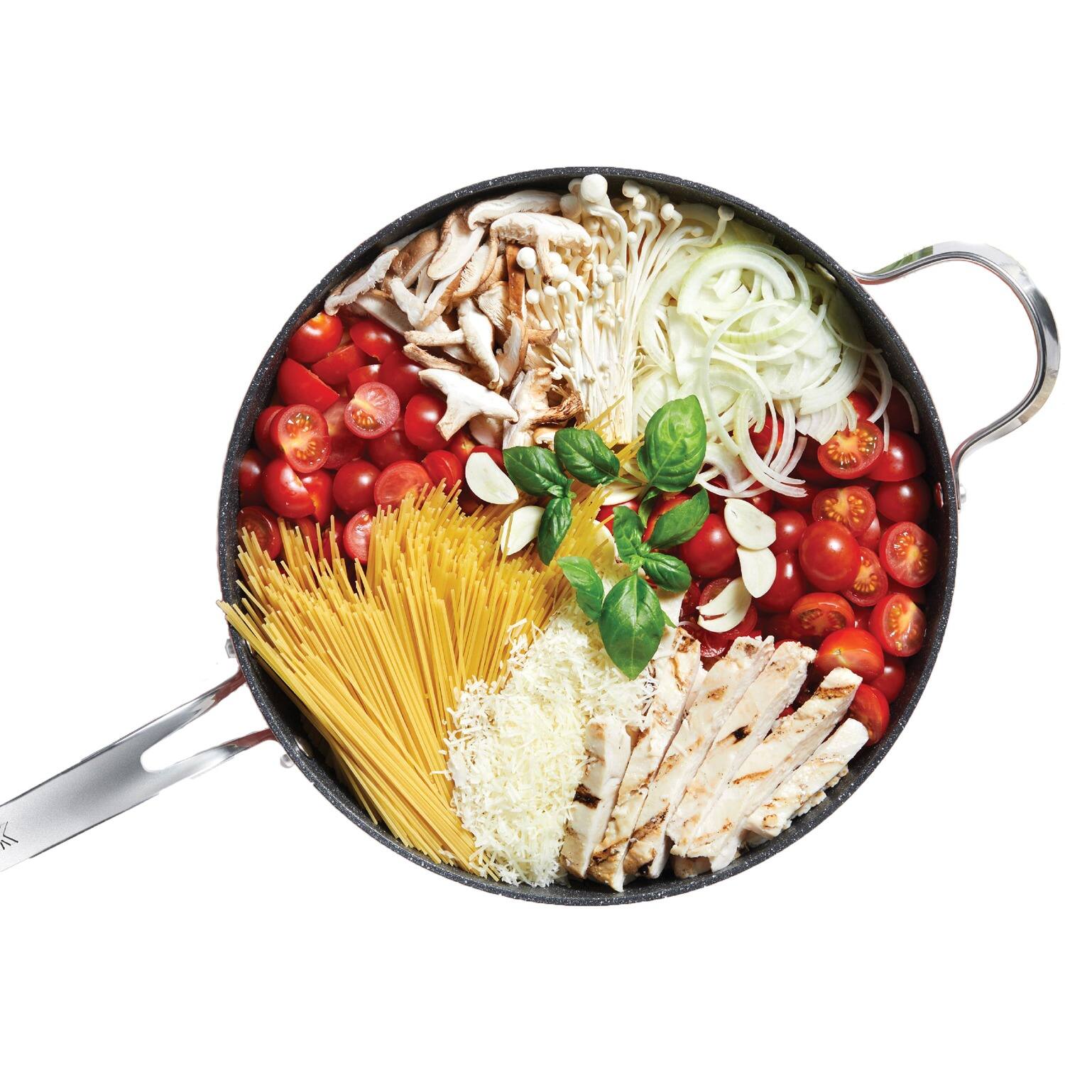 Back. THE ROCK by Starfrit - 11" 4.7-Quart Deep Sauté Pan with Glass Lid, Stainless Steel Handles - Black.