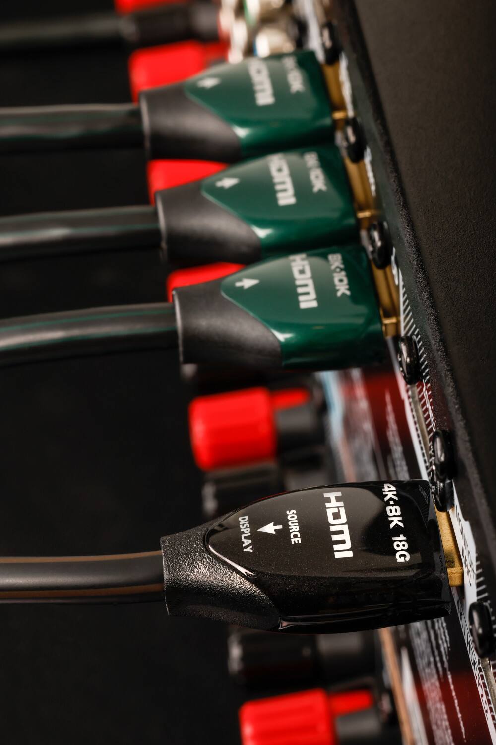 The text on the image reads:

"DMI  HDMI BK-10K DISPLAY SOURCE HDMI  4K-8K 18G PIEE"

The corrected text should be:

"DMI  HDMI BK-10K Display Source HDMI  4K-8K 18G Piece"