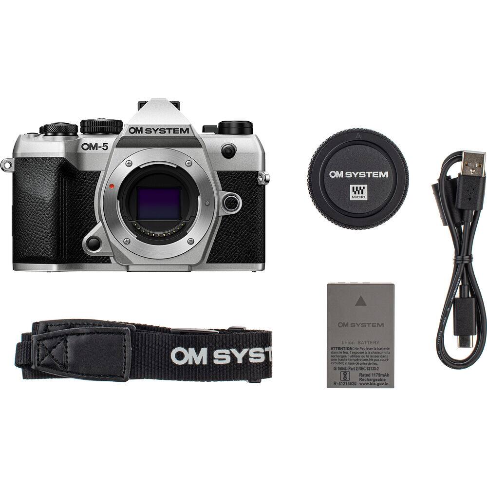 OM SYSTEM OM-5 OM SYSTEM WY MOR OM SYSTEM MO SYST Li-ion BATTERY ATTENTION - P e i namara dans . e  cha - . no ue --   mans une Ia m - couT nr - - - -e -u 3 0 at BC S-CUS  Rated 1175mAh Rechargeable R R-41214620 www.bis gevin
