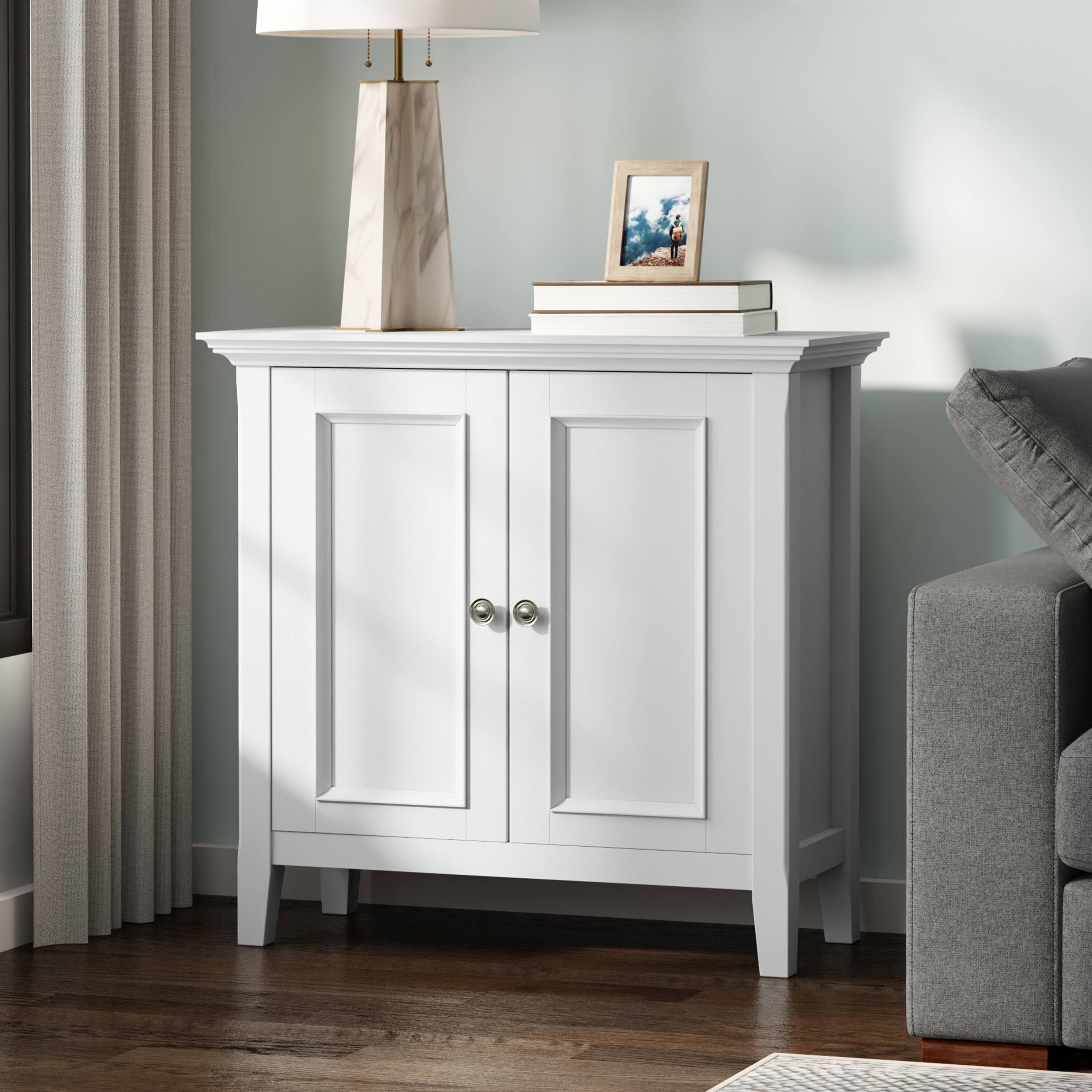 Angle. Simpli Home - Amherst 32 inch Wide Solid Wood Transitional Low Storage Cabinet in White - White.