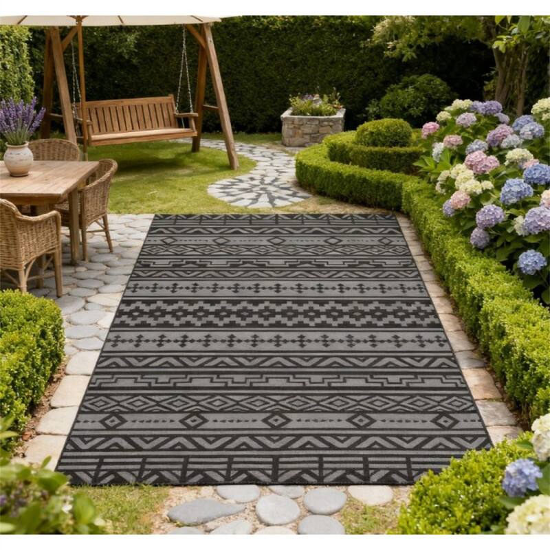 Angle. HTUTWOO - 6' x 9' Outdoor Reversible Rug - Waterproof Plastic Straw Patio Mat with Carry Bag,Polypropylene,Foldable Camping Carpet - Black Gray.
