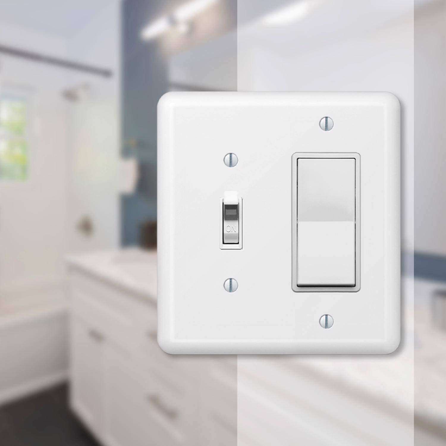 Left. AMERELLE - Amerelle Devon White 2 gang Stamped Steel Decorator/Toggle Wall Plate 1 pk - White.