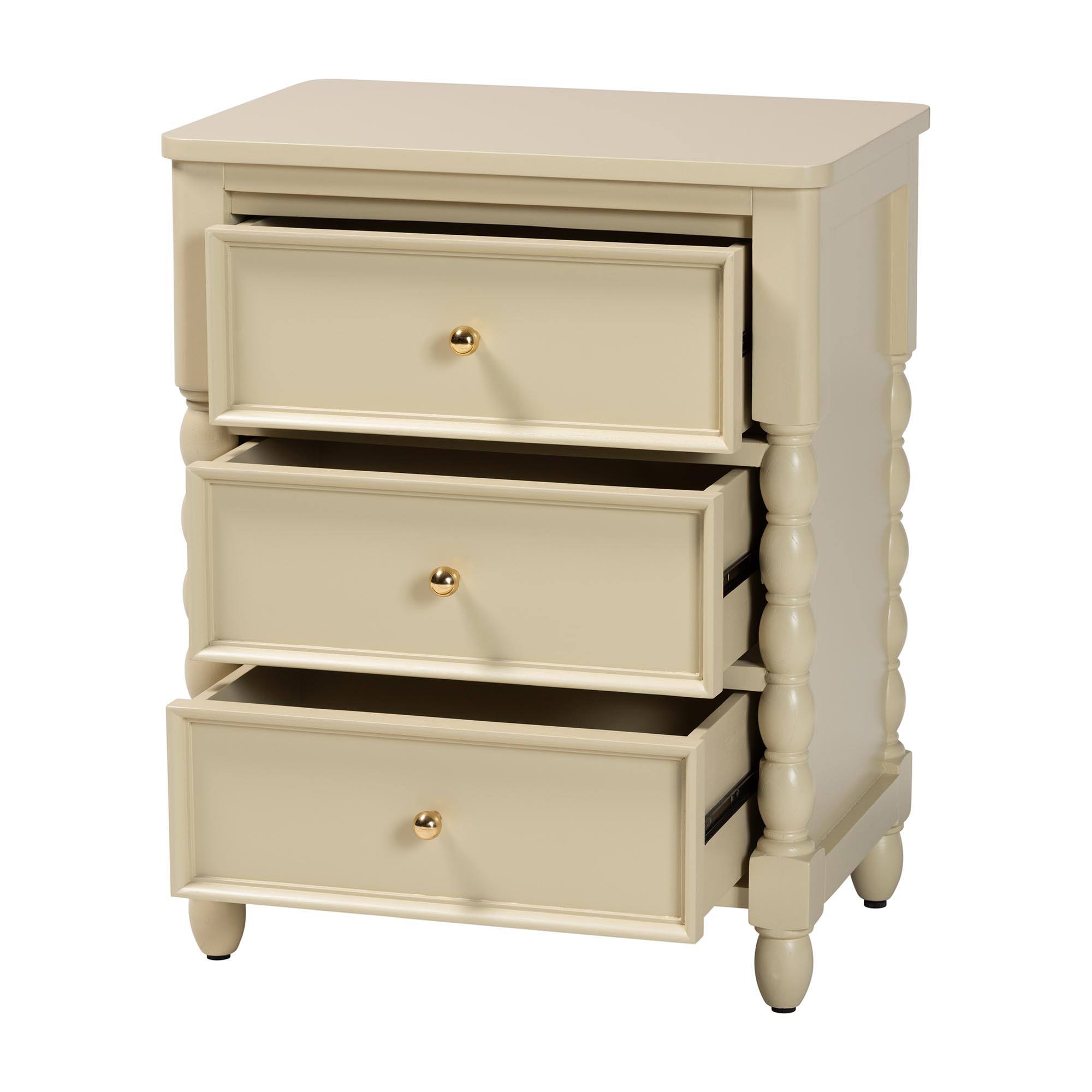 Angle. bali & pari - Kyla Nightstand with Spindle Legs - 3-Drawer Bedside Table with Turned Detailing and Inset Paneling - Beige.