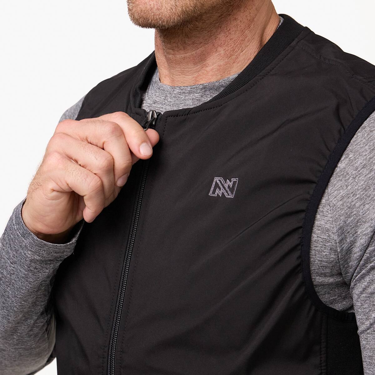 Left. Mobile Warming - Unisex Peak Heated Vest - Black.