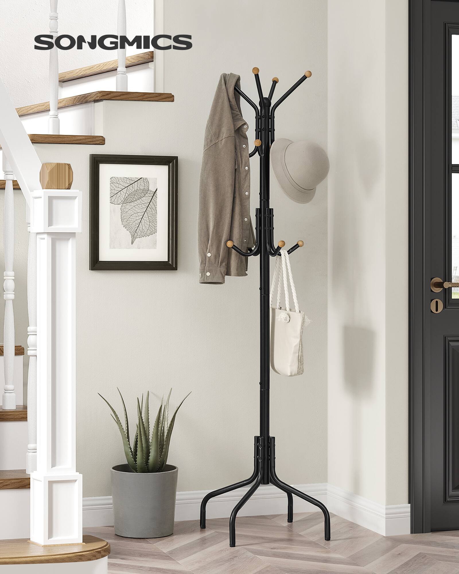 Angle. Songmics Home - Coat Rack Freestanding, Metal Coat Rack Stand with 12 Hooks and 4 Legs, Coat Tree, Holds Clothes, Hats, and Bags - Classic Black.
