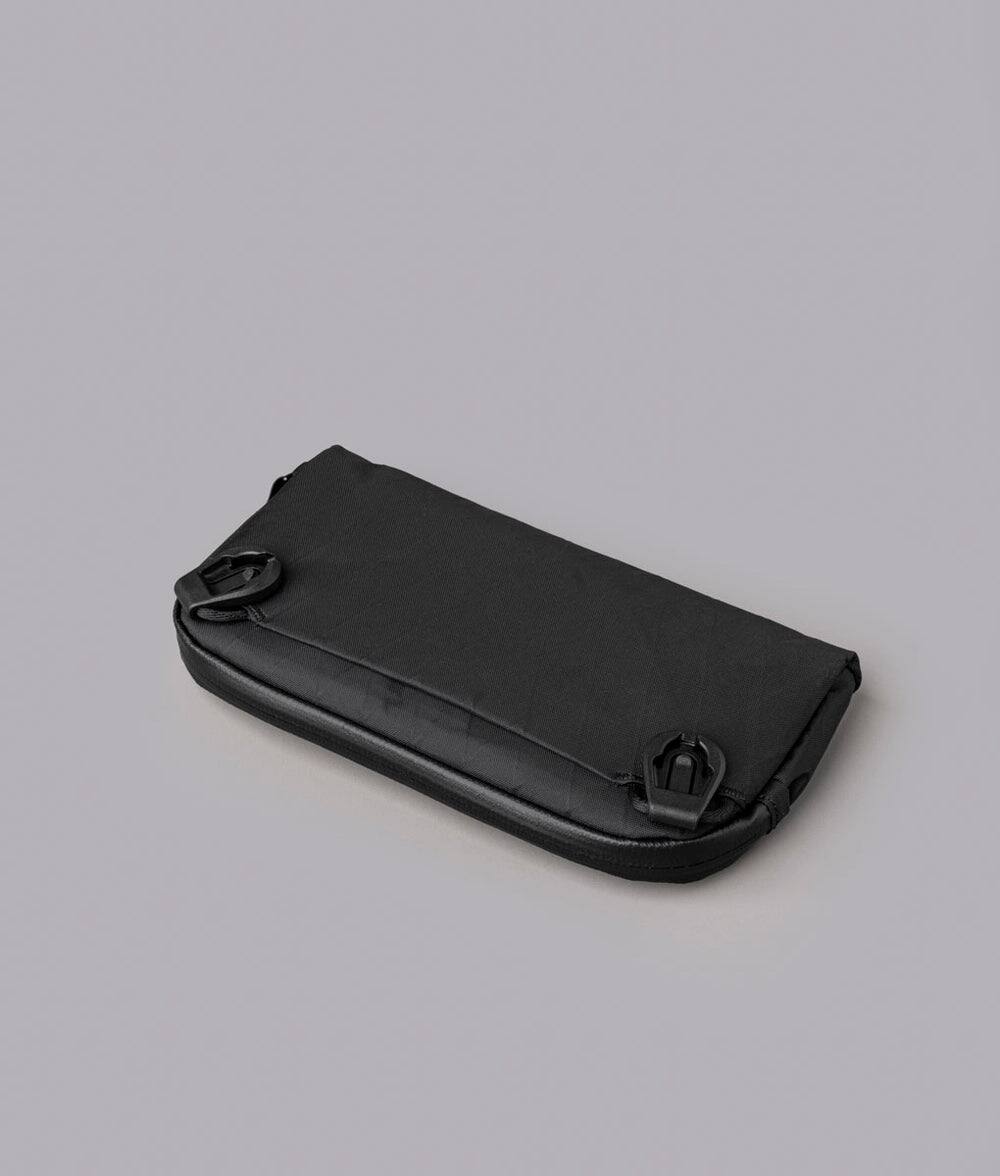 Back. ALPAKA - Flight Pouch Mens Travel Bag Crossbody Phone Case, 0.3L Travel Purse for Men,Water-Resistant Fabric - Black X-Pac VX42.