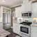 Alt View 2. Insignia™ - 1.7 Cu. Ft. Over-the-Range Microwave with 1,000W Cooking Power - Stainless Steel.