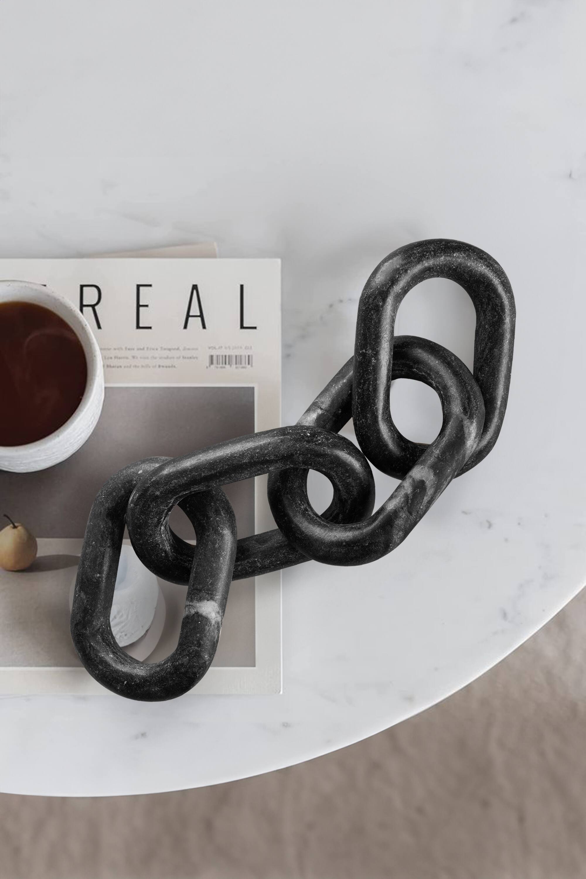 Left. GAURI KOHLI - Eternity Chain Links - Shades of black.