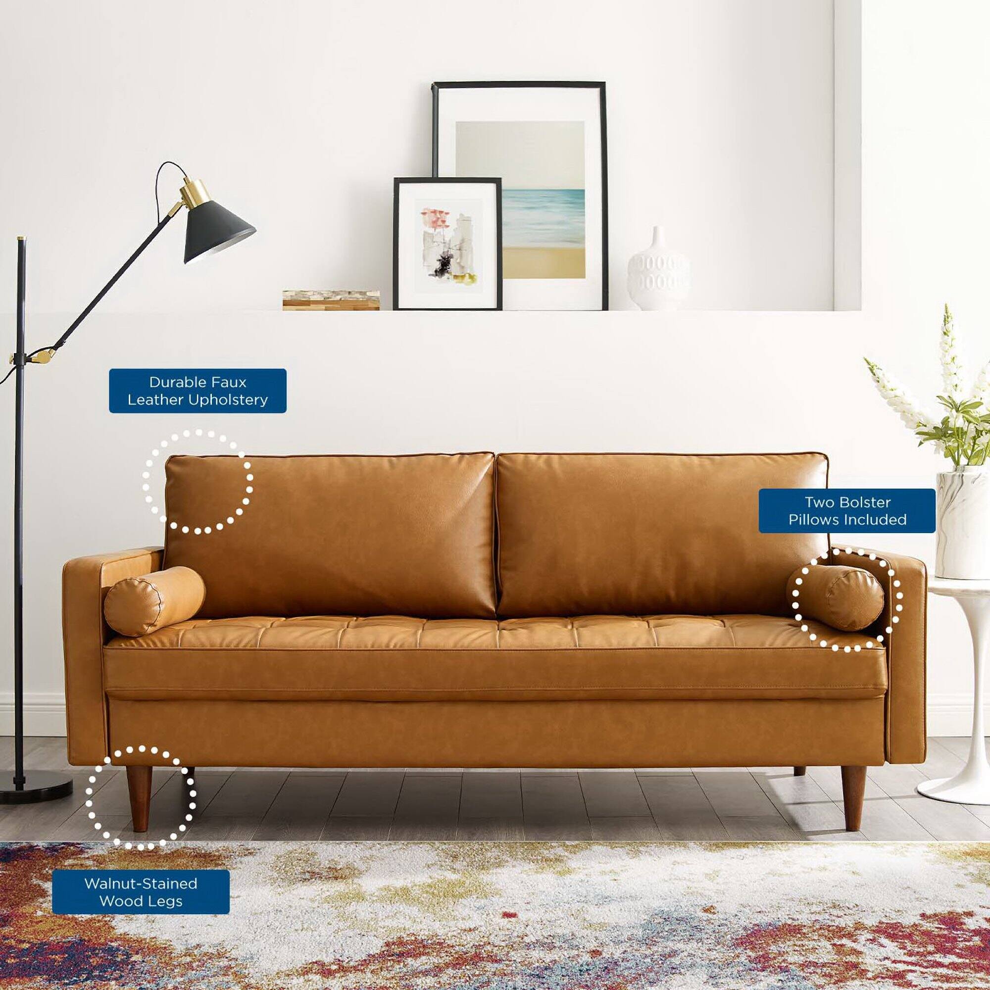 - Durable Faux Leather Upholstery
- Walnut-Stained Wood Legs
- Two Bolster Pillows Included