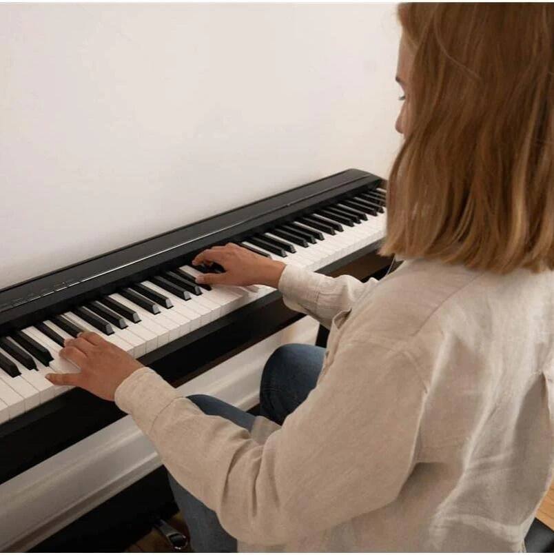 Angle. Kawai Pianos - ES120 88-Key Portable Digital Piano with Responsive Hammer Compact Action | Built-in Speaker System with Bluetooth MIDI - Light Gray.