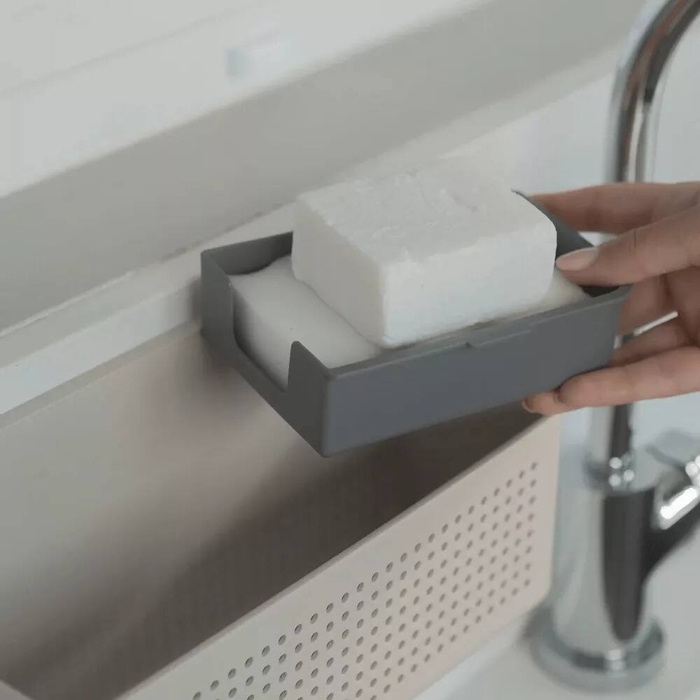 Left. OU - Hanging Sink Organizer, Self‑Adhesive Caddy with Removable Sponge Tray for Kitchen Storage - Beige.