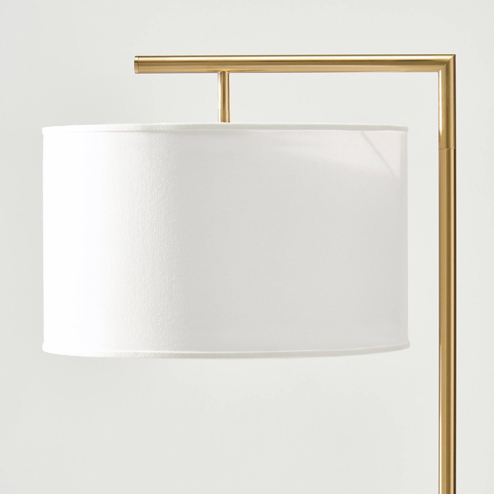 Back. Brightech - Montage Modern LED Midcentury Modern Arc Super Bright Floor Lamp with Ivory White Fabric Drum Shade - Antiqued Brass.