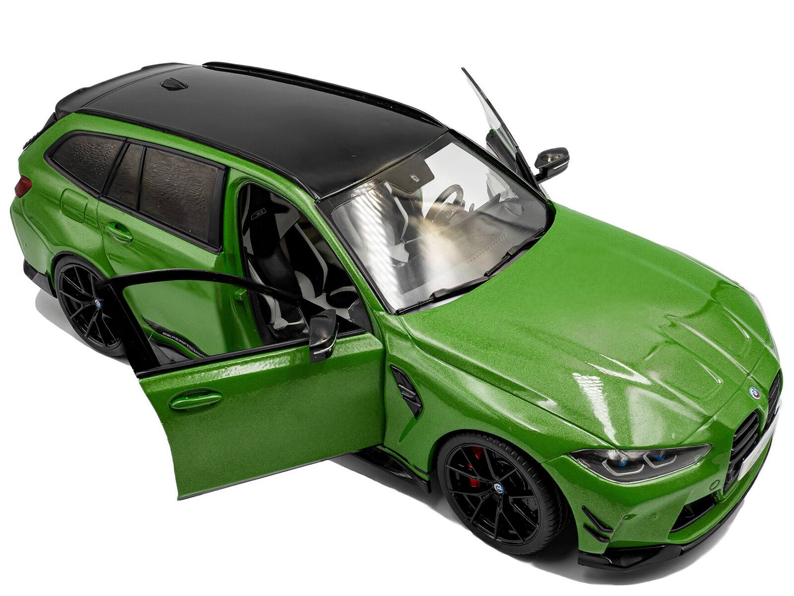 Alt View 1. Solido - 2024 BMW M3 Competition M xDrive Touring Green Metallic with Black Top 1/18 Diecast Model Car by Solido.