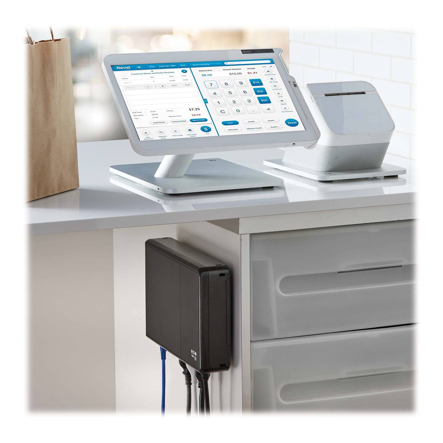 Sure, here is the corrected and grouped text from the image:

---

**Revel**

**Customer Order Number:** 123456  
**Date:** 01/01/2023  
**Time:** 12:00 PM  

**Items:**

1. **Item 1**  
   - **Quantity:** 1  
   - **Price:** $5.00  
   - **Total:** $5.00  

2. **Item 2**  
   - **Quantity:** 1  
   - **Price:** $7.25  
   - **Total:** $7.25  

3. **Item 3**  
   - **Quantity:** 1  
   - **Price:** $2.99  
   - **Total:** $2.99  

**Subtotal:** $15.24  
**Tax:** $1.41  
**Total:** $16.65  

**Payment:**  
- **Cash:** $10.00  
- **Change:** $3.35  

**Buttons:**  
- **Done**  
- **Void**  
- **Manual Card**  
- **Close**  

**