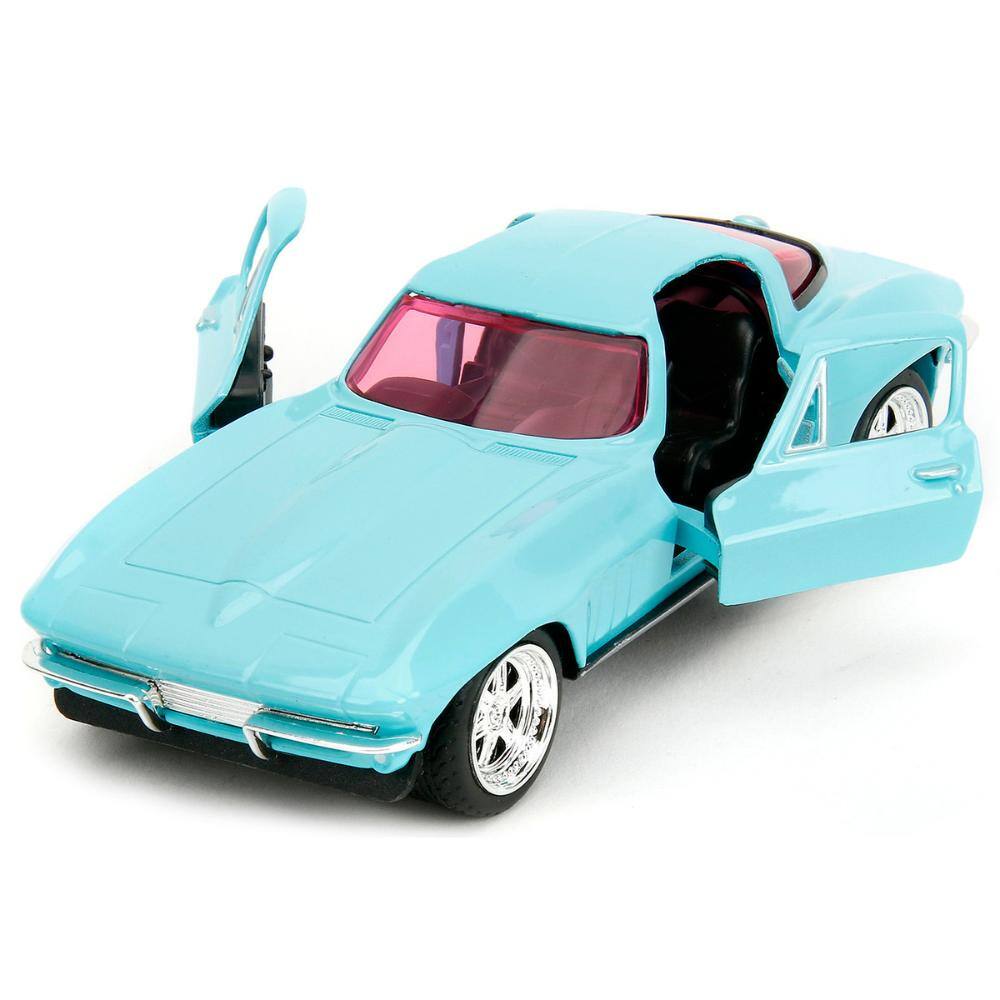 Angle. Jada - 1966 Chevrolet Corvette Light Blue with Pink Tinted Windows "Pink Slips" Series 1/32 - Light Blue and Pink.