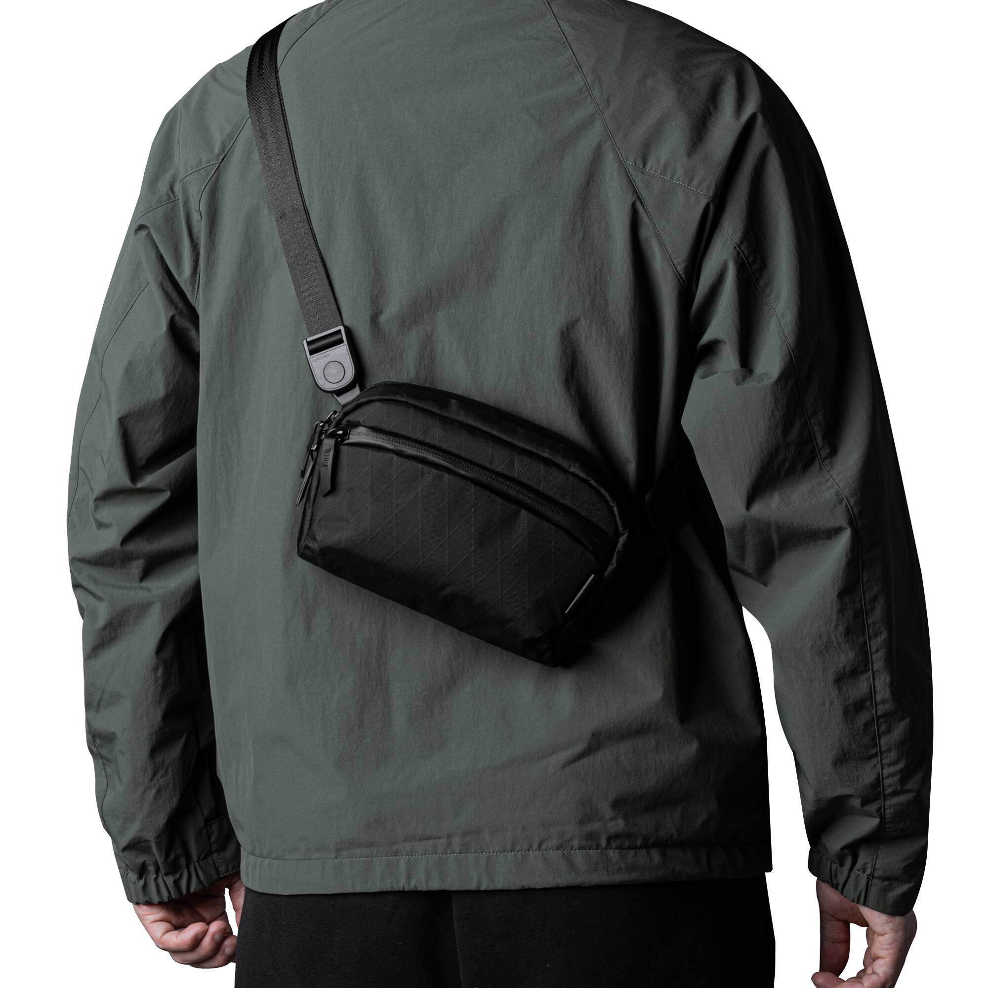 Alt View 4. ALPAKA - Travel Sling Bag 1L for Men, Detachable Strap Converts to Pouch, Phone Sleeve, Hidden Rear Pocket, YKK Zippers - Black X-Pac VX42.
