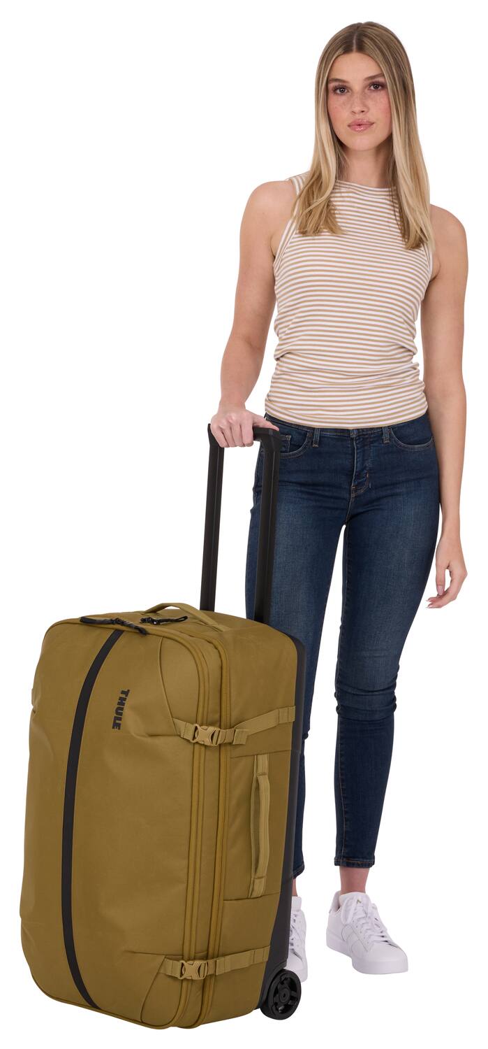 Alt View 1. Thule - Aion Wheeled Duffel – 70cm Eco-Friendly Rolling Travel Bag - Nutria Brown.