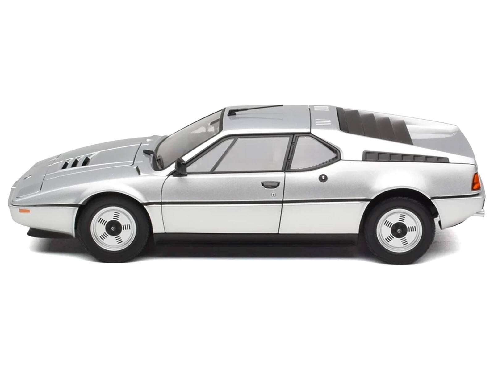 Left. Norev - 1980 BMW M1 Silver Metallic 1/18 Diecast Model Car by Norev - Silver Metallic.