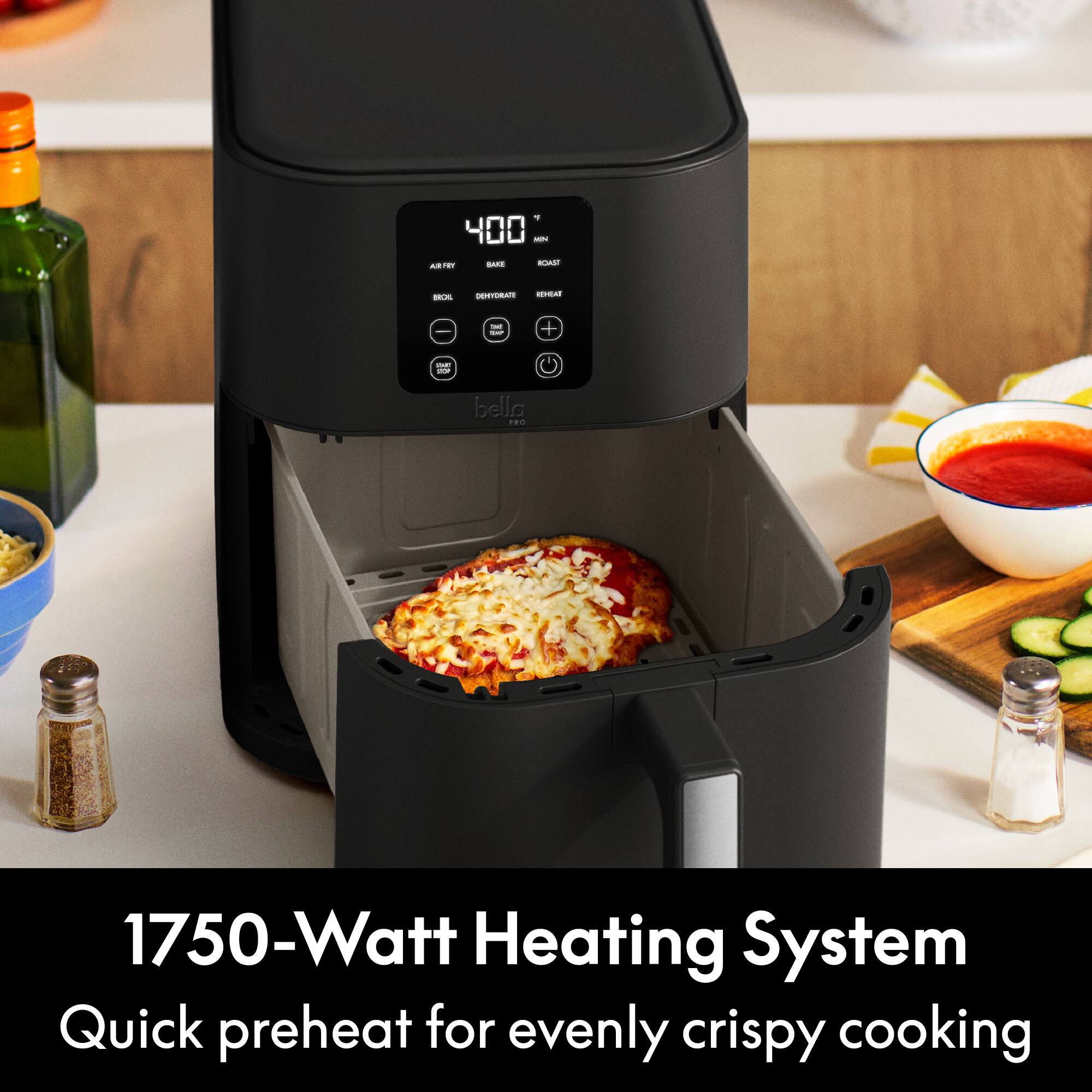 5 400 MIN BAKE ROAST AIR FRY  
BROIL  
DEHYDRATE REHEAT  
THE TXP  
+  
THE STOP  
bella PRO  
1750-Watt Heating System Quick preheat for evenly crispy cooking