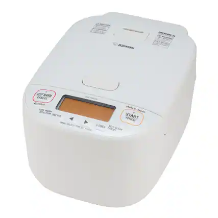 Sure, here is the corrected and grouped text from the image:
---
**Zojirushi**
**NW-YNC10**
**Made in Japan**
**Pressure In**
**Keep Warm Cancel**
**Keep Warm Selection**
**Rice Type**
**Menu Select/Time Set (Hold)**
**Timer**
**Start Reheat**
**Self-Clean (Hold)**
**Pressure Off**
**Warning**
**Keep Warm (Hold)**
**Self-Clean (Hold)**
---