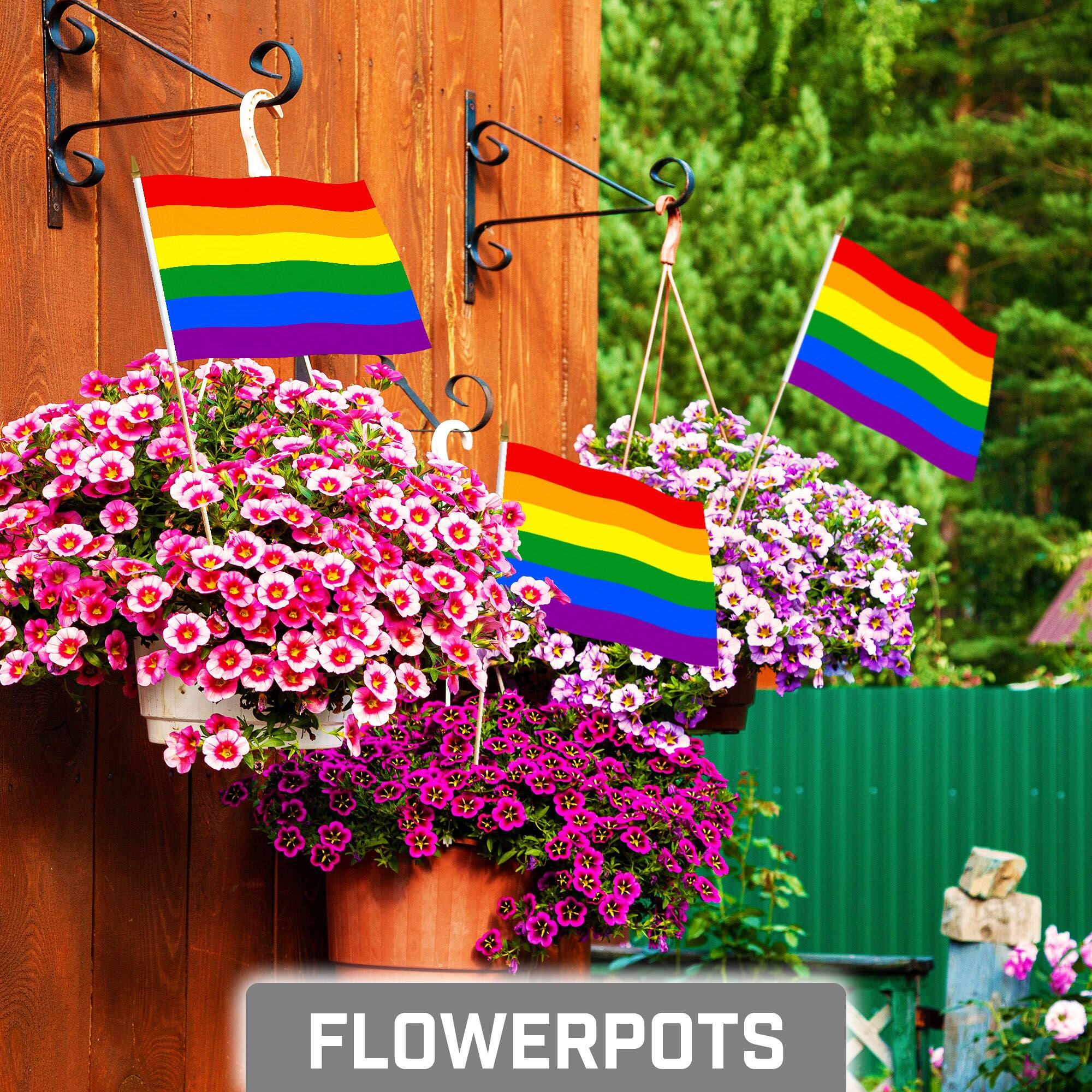 Angle. G128 - 30-Pack Handheld LGBT Rainbow Pride Flags 8x12 In - Assorted Colors.