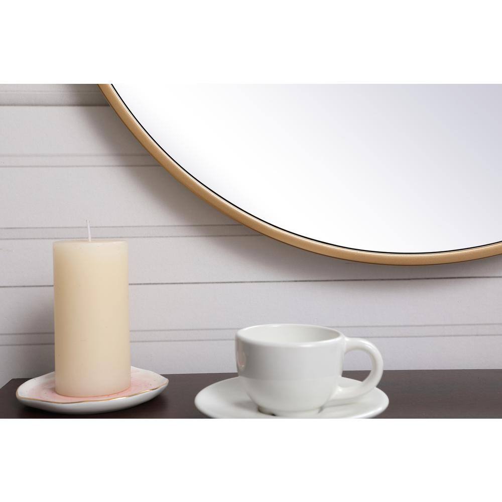 Back. Elegant Decor - Metal frame round mirror with decorative hook 21 inch in Brass - Brass.